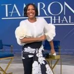 Tamron’s white ruffle sleeve top and pants on Tamron Hall Show