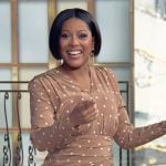 Tamron’s beige polka dot print dress on Tamron Hall Show