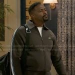 Ted’s brown track jacket on Beyond the Gates