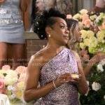Tina’s metallic one-shoulder dress with ruffle on The Neighborhood