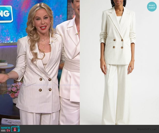 Tara Lipinski’s white pinstripe blazer on The Kelly Clarkson Show Tara Lipinski’s white pinstripe blazer on The Kelly Clarkson Show