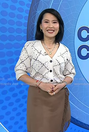 Vicky’s white stitched cardigan and fringed wrap skirt on Today