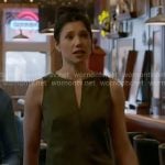 Violet’s olive green split-neck top on Chicago Fire