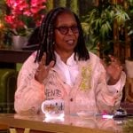 Whoopi’s embroidered denim overalls and printed shirt on The View